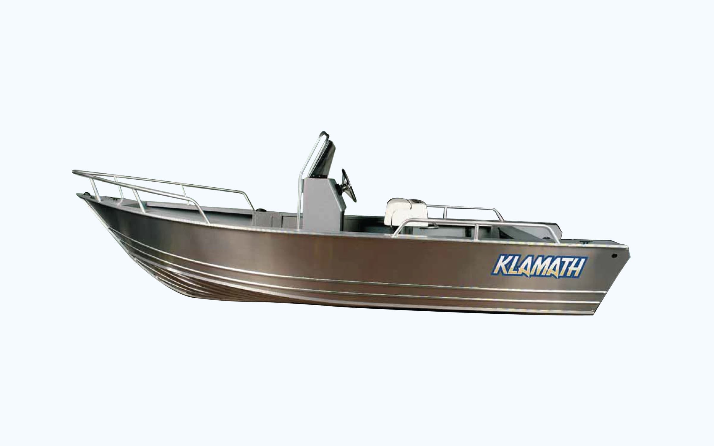 A bare aluminum Klamath fishing boat — open hull, simple console, no electronics or rod holders